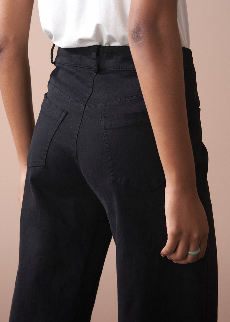 Black wide leg raw hem cotton trousers