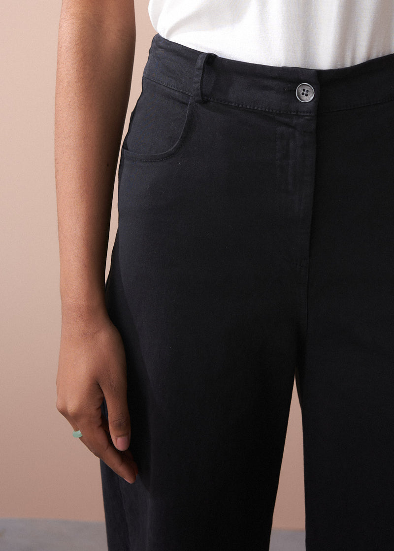 Black wide leg raw hem cotton trousers