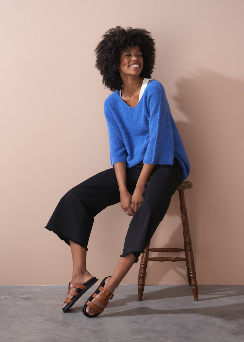 Black wide leg raw hem cotton trousers