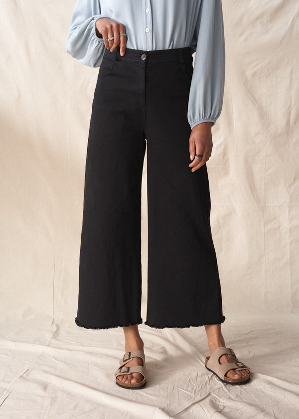 black wide leg raw hem cotton trousers