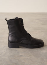 Black leather lace up ankle boots.