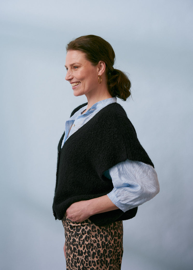 Black oversized v neck knitted waistcoat
