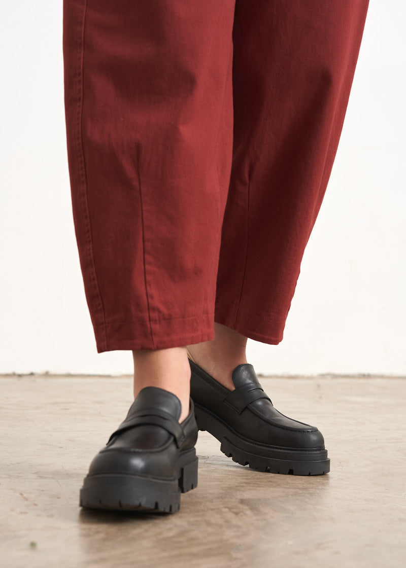 Rust red cotton trousers
