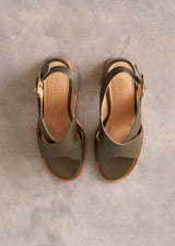 Khaki green leather sandal with wooden heel and buckle detail