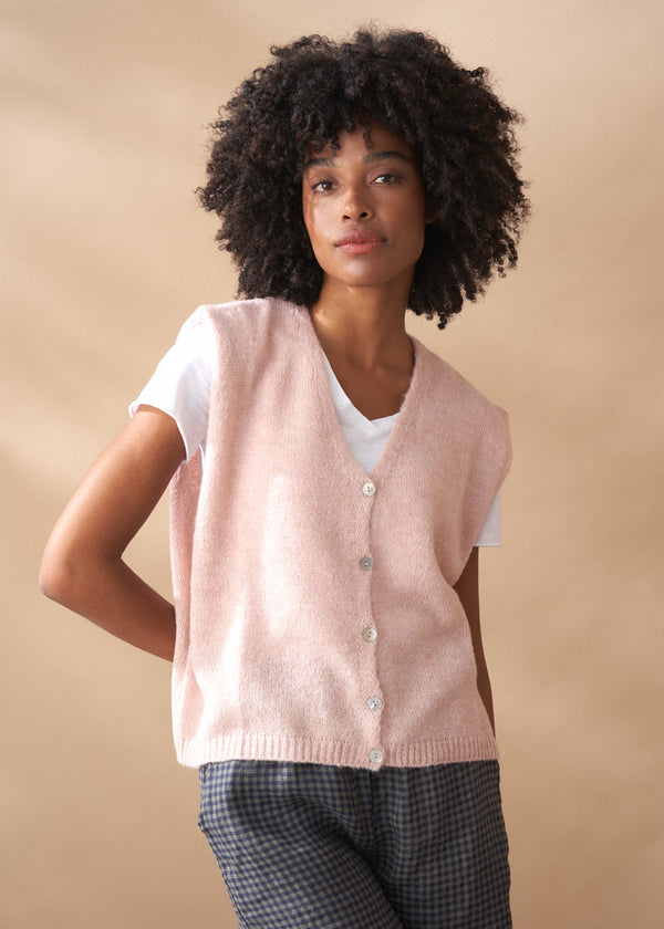 Light pink knitted waistcoat with buttons