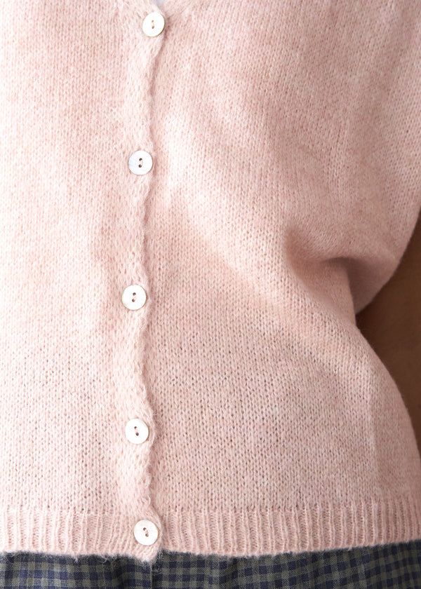 Light pink kniLight pink knitted waistcoat with buttonstted waistcoat with buttons