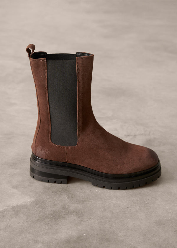 Brown Chelsea boot on a gray background