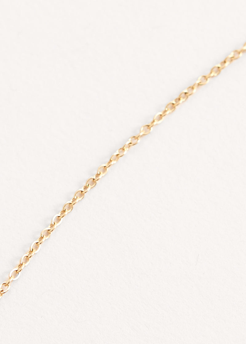 Minimal gold necklace with teardrop pendant