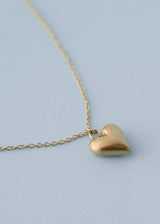 Gold heart pendant necklace