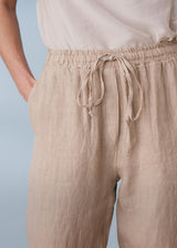 Light beige drawstring slim fit linen trousers