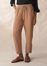 camel coloured straight linen trousers