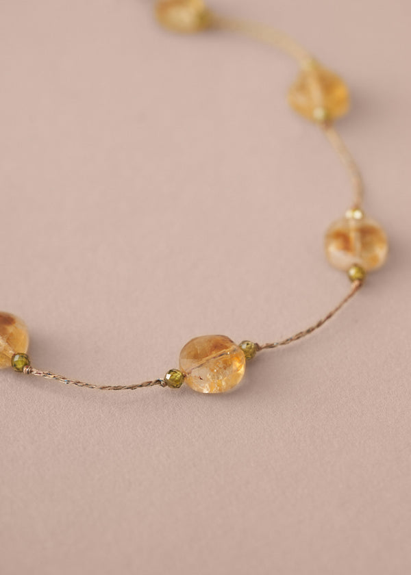 Gold and yellow beaded necklace