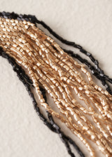 Gold and black beaded tassel statement earrings