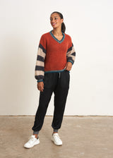 Red sweater with stripe and metallic detail