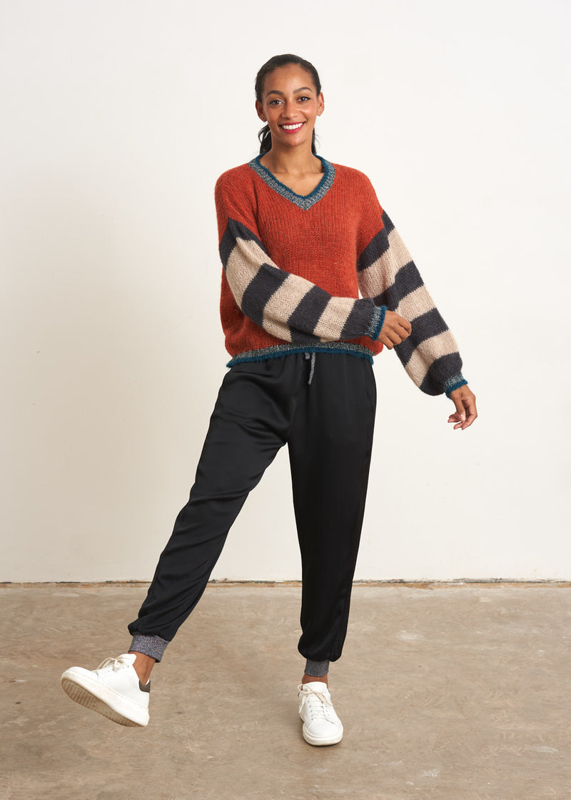 Red sweater with stripe and metallic detail