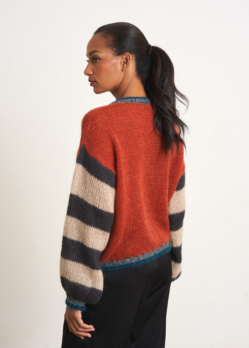 Red sweater with stripe and metallic detail