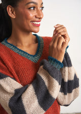 Red sweater with stripe and metallic detail