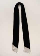 A black knit scarf with fringed ends, displayed vertically against a plain off-white background.