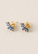 Floral stud earrings with blue crystals