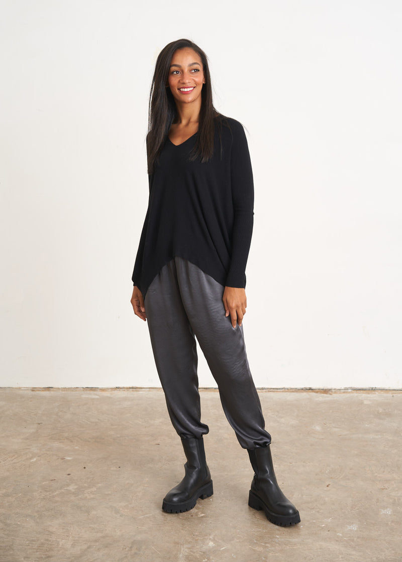 Black v-neck draped sweater