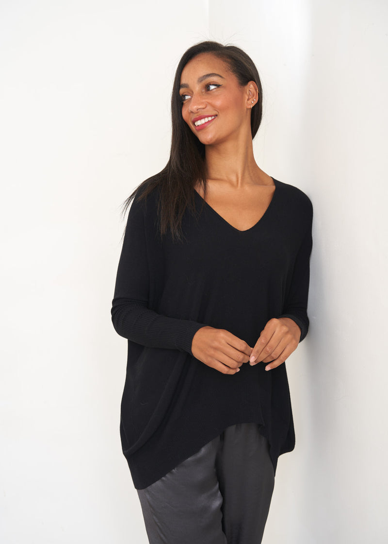Black v-neck draped sweater