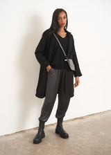 Black v-neck draped sweater