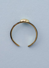 simple gold ring with gold bead