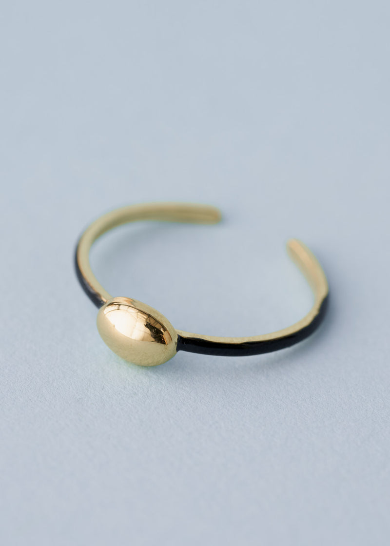 simple gold ring with gold bead