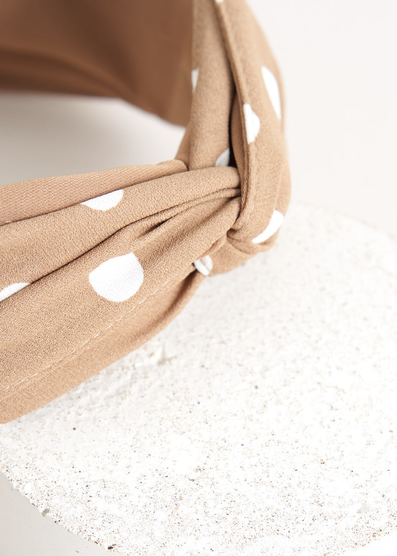 Tan and white spot print