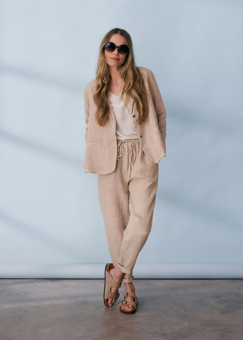 Light beige drawstring slim fit linen trousers