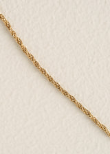 Gold necklace with fish and pearl charms