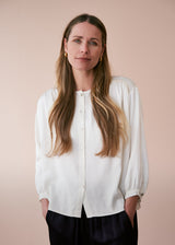 Off white satin top with crochet detail