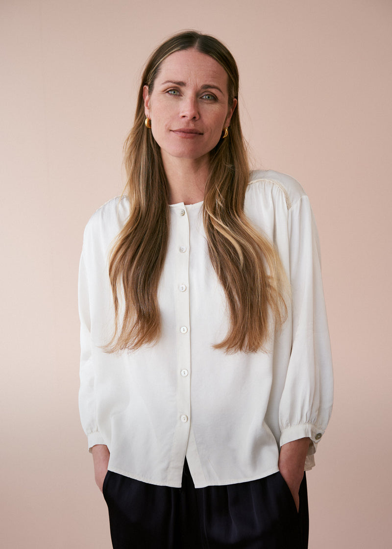 Off white satin top with crochet detail