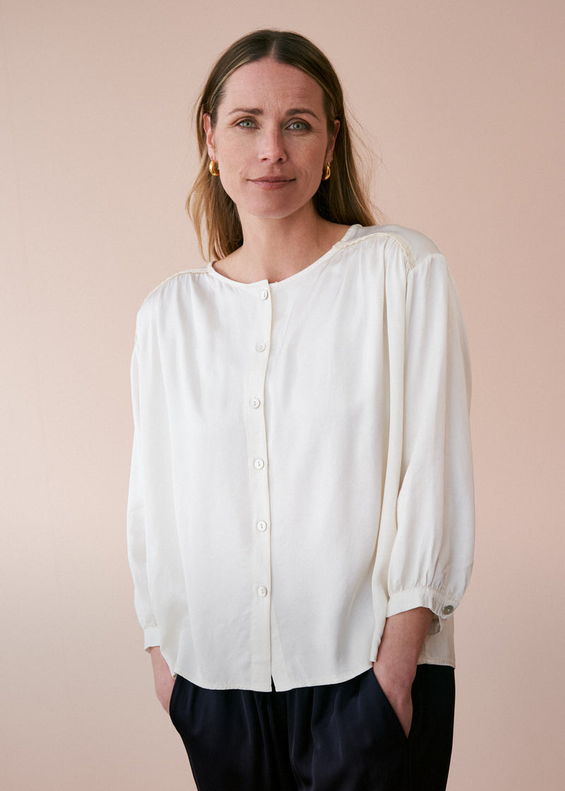 Off white satin top with crochet detail