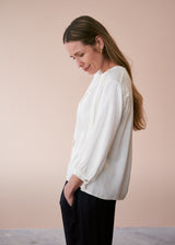 Off white satin top with crochet detail
