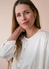 Off white satin top with crochet detail