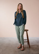 Dark blue satin top with glitter cuffs