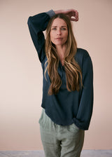 Dark blue satin top with glitter cuffs
