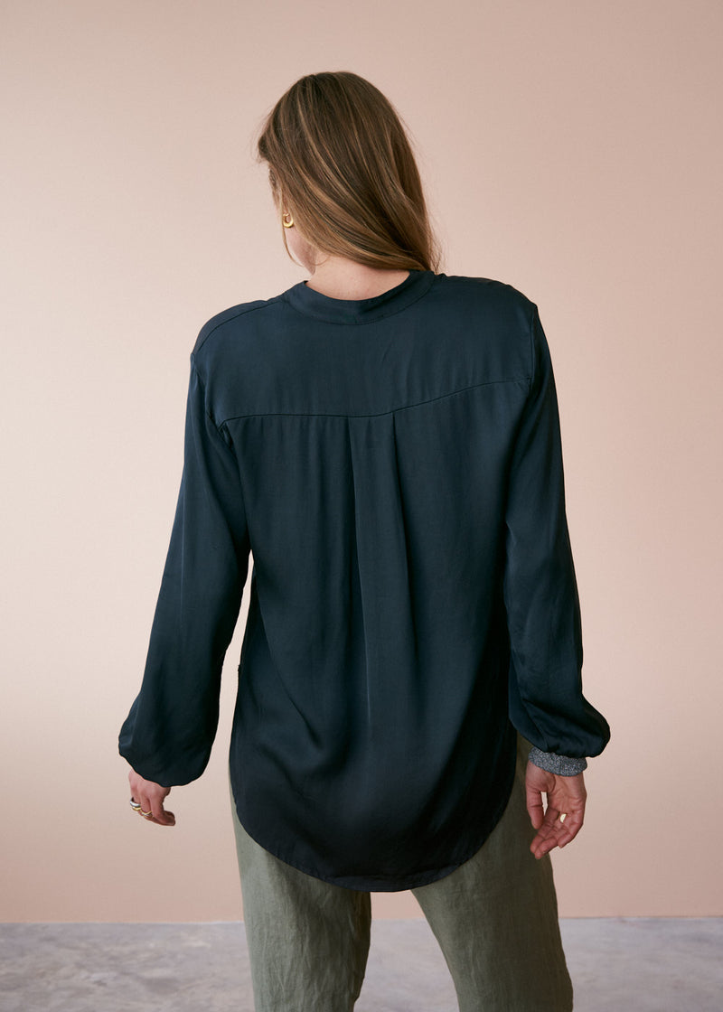 Dark blue satin top with glitter cuffs
