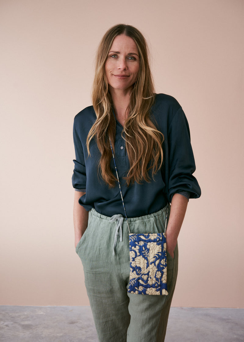 Dark blue satin top with glitter cuffs