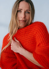 Tomato red open knit cardigan