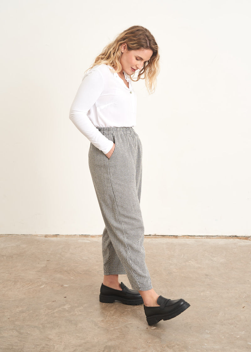 Grey and white check trousers