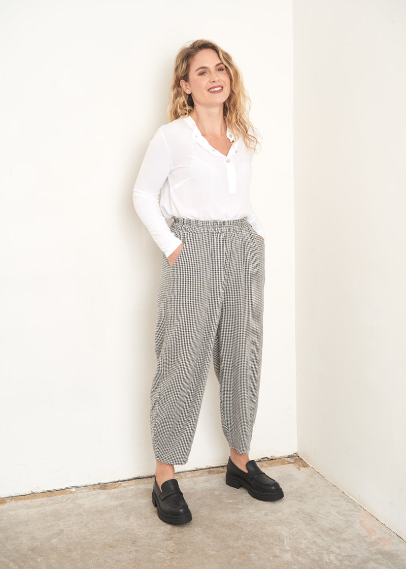 Grey and white check trousers