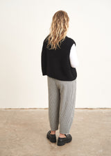Grey and white check trousers