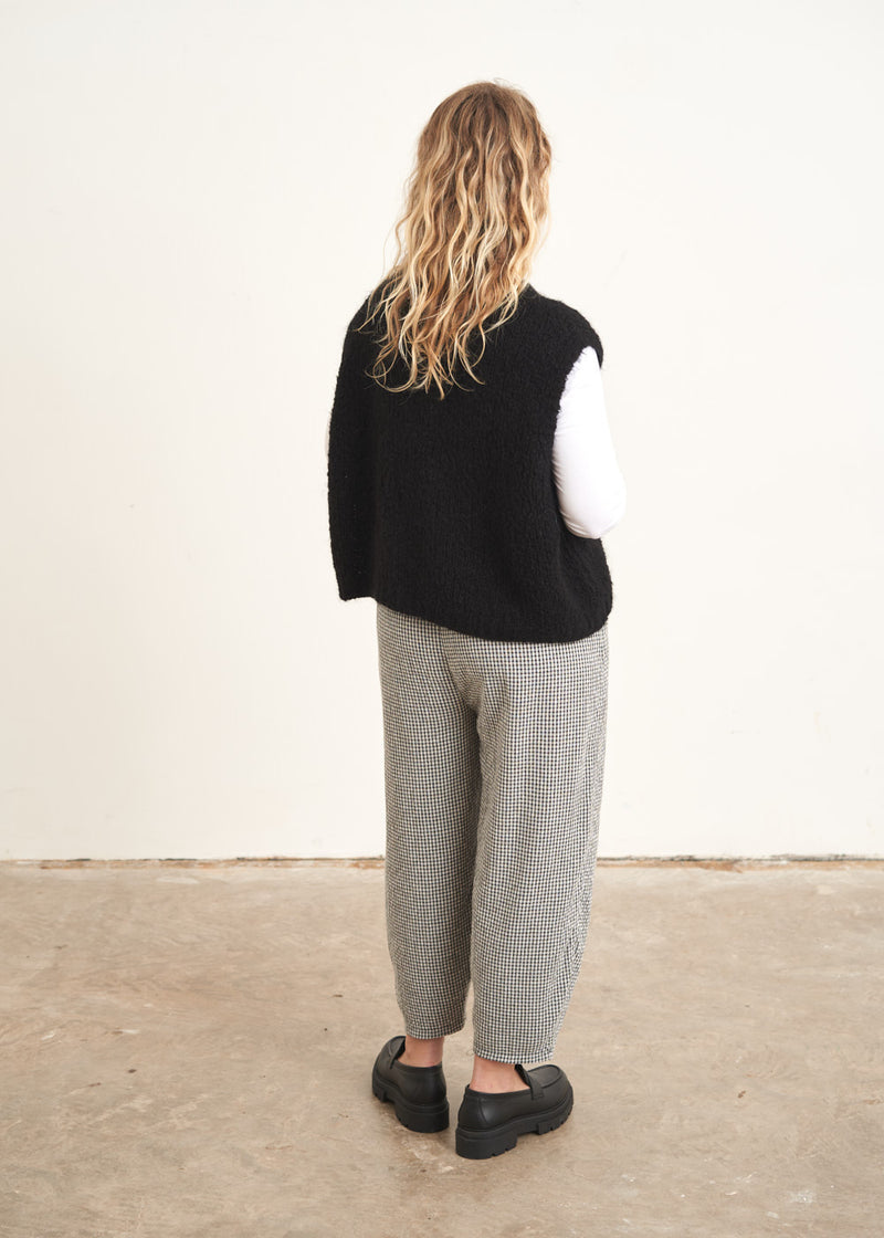 Grey and white check trousers