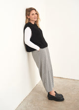 Grey and white check trousers