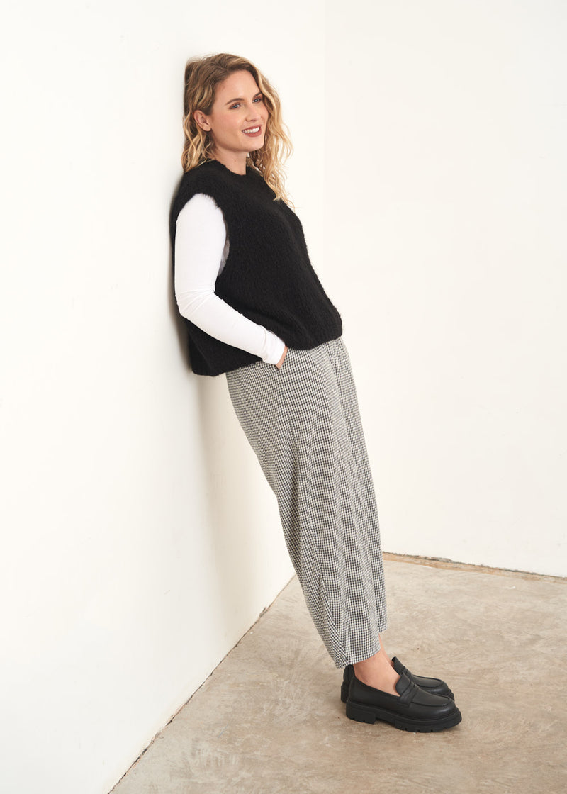 Grey and white check trousers