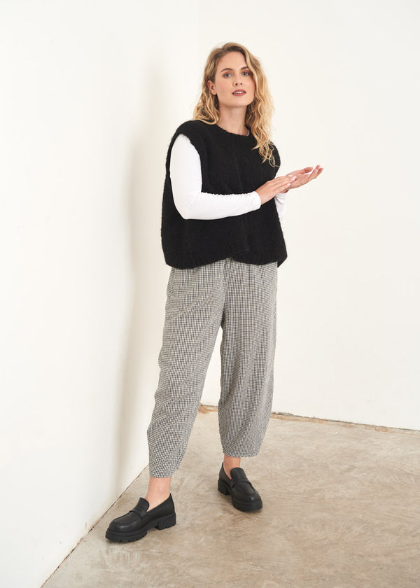 Grey and white check trousers