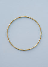 Gold twisted bangle