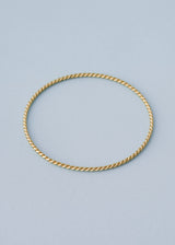 Gold twisted bangle